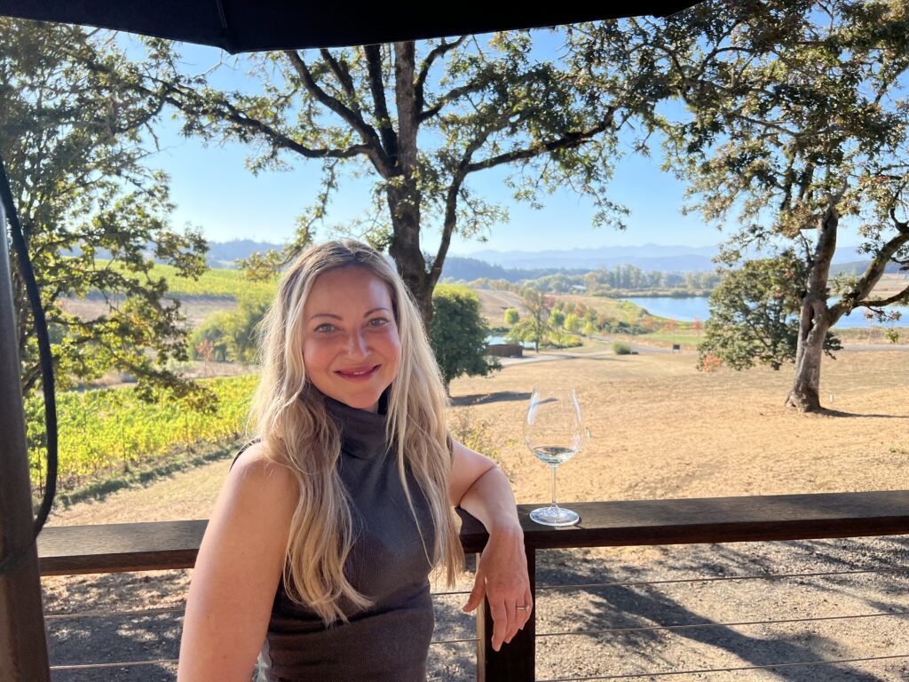 Heidi Standing with Landscape Background